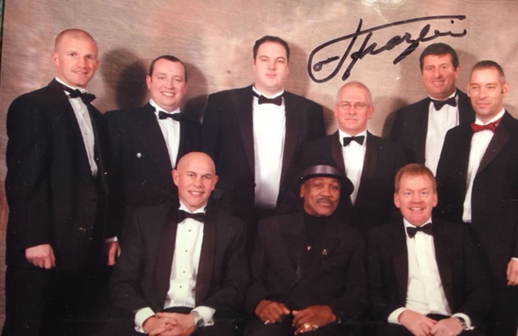 Coaches with the legendary Joe Frazier